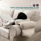 Person using a Teddy Velvet Multifunctional Pillow on a couch with TexStead branding.